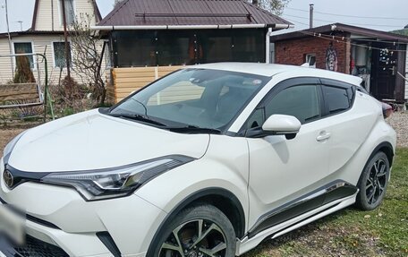 Toyota C-HR I рестайлинг, 2019 год, 2 200 000 рублей, 2 фотография