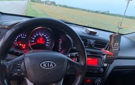 KIA Rio III рестайлинг, 2012 год, 850 000 рублей, 19 фотография