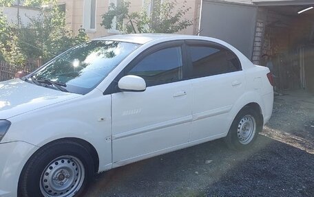 KIA Rio II, 2011 год, 650 000 рублей, 3 фотография