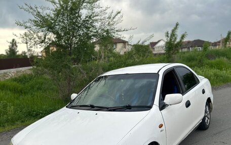 Mazda Familia, 1996 год, 210 000 рублей, 3 фотография