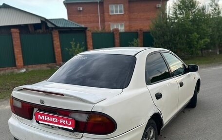 Mazda Familia, 1996 год, 210 000 рублей, 6 фотография