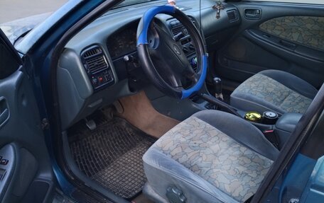 Toyota Avensis III рестайлинг, 1998 год, 235 000 рублей, 7 фотография