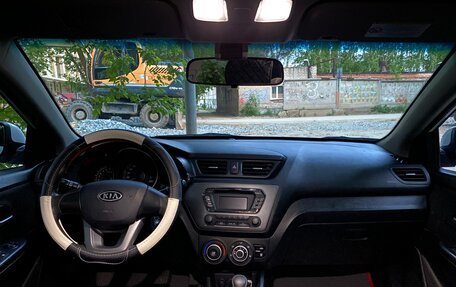 KIA Rio III рестайлинг, 2012 год, 1 040 000 рублей, 23 фотография