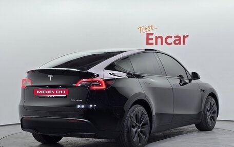Tesla Model Y I, 2024 год, 6 034 979 рублей, 4 фотография