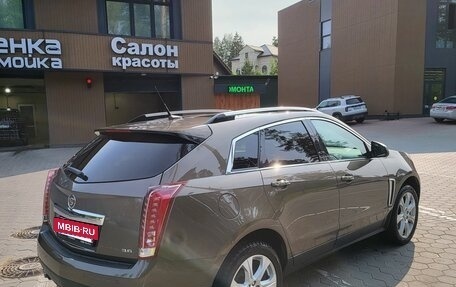Cadillac SRX II рестайлинг, 2014 год, 1 500 000 рублей, 2 фотография