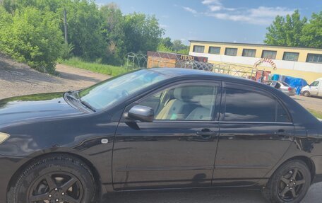 Toyota Corolla, 2004 год, 750 000 рублей, 7 фотография