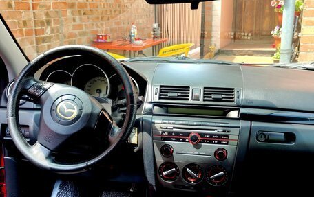 Mazda 3, 2008 год, 12 фотография