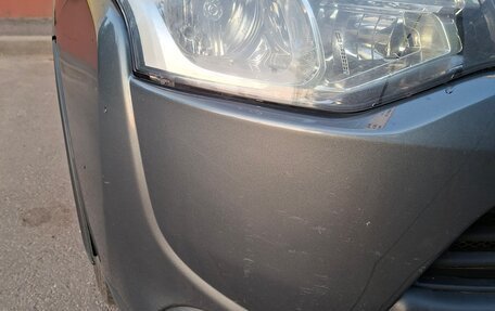 Mitsubishi Outlander III рестайлинг 3, 2014 год, 1 400 000 рублей, 11 фотография