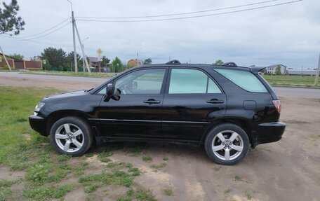 Lexus RX IV рестайлинг, 2000 год, 850 000 рублей, 9 фотография