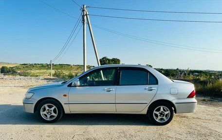 Mitsubishi Lancer IX, 2001 год, 310 000 рублей, 3 фотография
