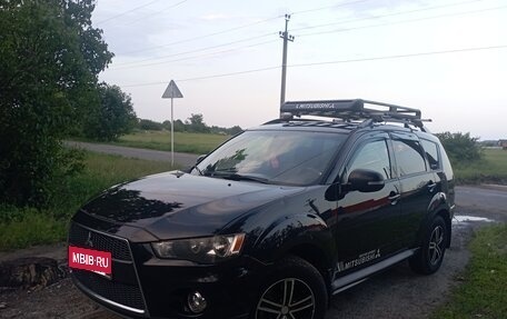 Mitsubishi Outlander III рестайлинг 3, 2011 год, 980 000 рублей, 2 фотография