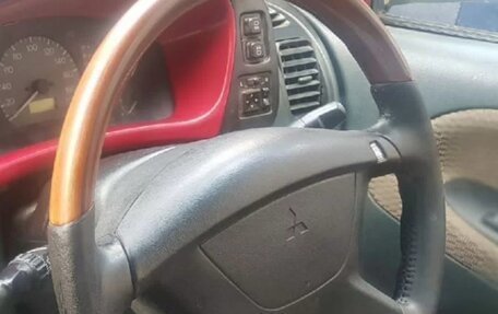 Mitsubishi Mirage VI рестайлинг, 1998 год, 110 000 рублей, 13 фотография