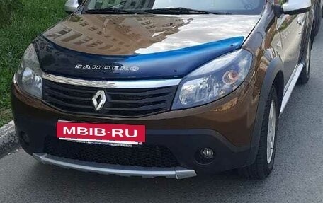 Renault Sandero II рестайлинг, 2013 год, 730 000 рублей, 9 фотография