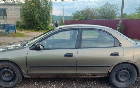 Mazda Protege, 1997 год, 110 000 рублей, 3 фотография
