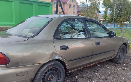 Mazda Protege, 1997 год, 110 000 рублей, 8 фотография