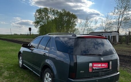 Cadillac SRX II рестайлинг, 2007 год, 600 000 рублей, 3 фотография