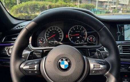 BMW 7 серия, 2011 год, 11 фотография