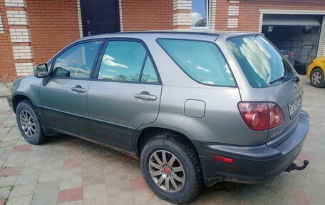 Lexus RX IV рестайлинг, 2000 год, 730 000 рублей, 2 фотография