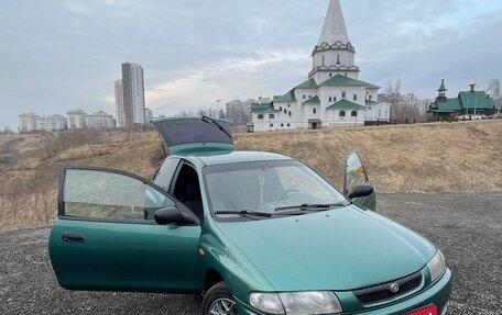 Mazda 323, 1997 год, 210 000 рублей, 4 фотография