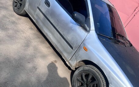 Mazda 323, 1998 год, 100 000 рублей, 6 фотография