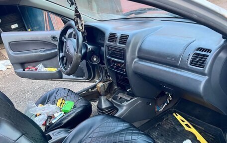 Mazda 323, 1998 год, 100 000 рублей, 2 фотография