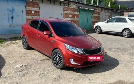 KIA Rio III рестайлинг, 2011 год, 1 050 000 рублей, 13 фотография