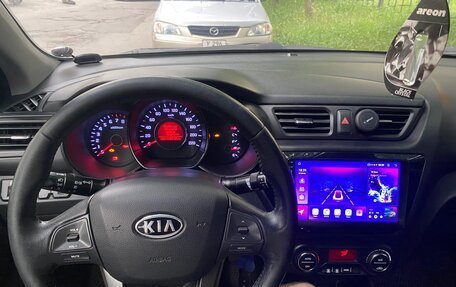KIA Rio III рестайлинг, 2011 год, 1 050 000 рублей, 27 фотография