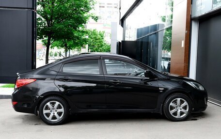 Hyundai Solaris II рестайлинг, 2011 год, 697 000 рублей, 4 фотография