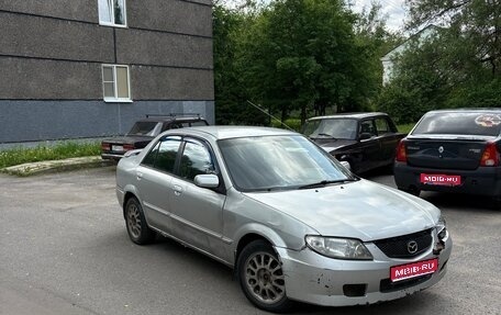 Mazda Protege, 2001 год, 100 000 рублей, 1 фотография