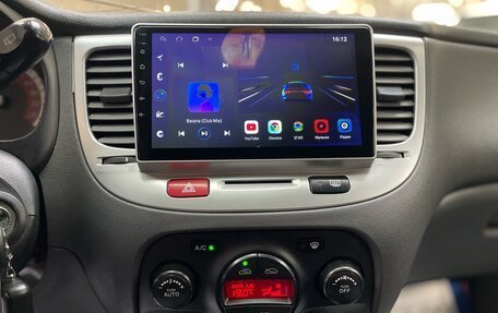 KIA Rio II, 2011 год, 690 000 рублей, 13 фотография