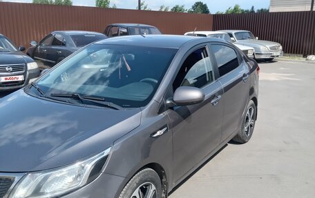 KIA Rio III рестайлинг, 2011 год, 850 000 рублей, 2 фотография