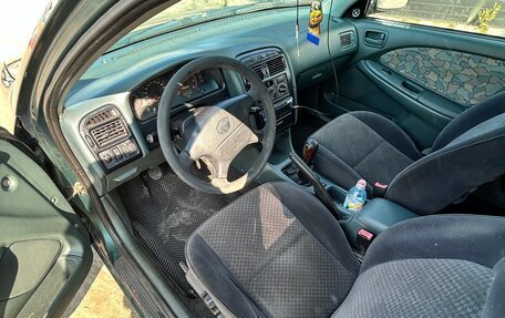Toyota Avensis III рестайлинг, 1998 год, 355 000 рублей, 7 фотография