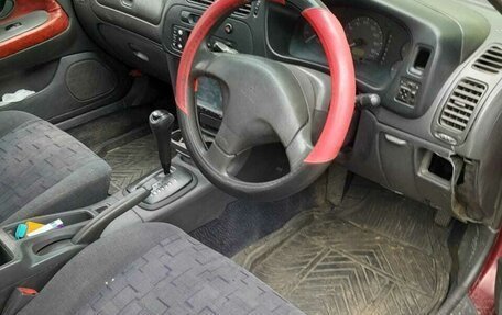 Mitsubishi Mirage VI рестайлинг, 1997 год, 130 000 рублей, 8 фотография