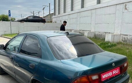 Mazda 323, 1997 год, 145 000 рублей, 7 фотография