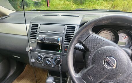 Nissan Tiida, 2010 год, 550 000 рублей, 4 фотография