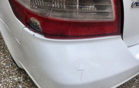 Nissan Tiida, 2010 год, 550 000 рублей, 8 фотография