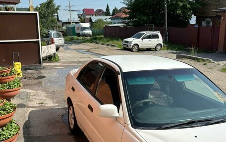 Mitsubishi Lancer VII, 1998 год, 355 000 рублей, 1 фотография