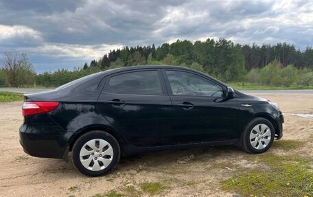 KIA Rio III рестайлинг, 2013 год, 750 000 рублей, 3 фотография