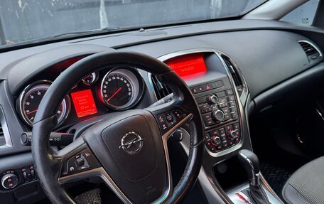 Opel Astra J, 2011 год, 670 000 рублей, 9 фотография
