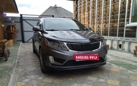 KIA Rio III рестайлинг, 2013 год, 915 000 рублей, 2 фотография