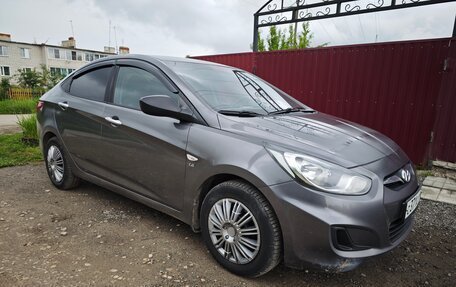 Hyundai Solaris II рестайлинг, 2011 год, 650 000 рублей, 2 фотография