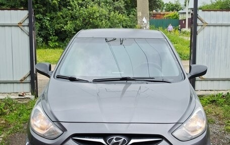 Hyundai Solaris II рестайлинг, 2011 год, 650 000 рублей, 3 фотография