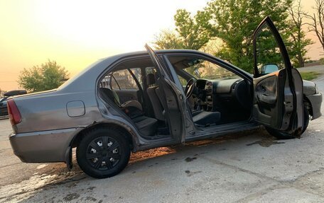 Mitsubishi Lancer VII, 1998 год, 230 000 рублей, 3 фотография