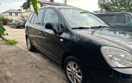 KIA Carens III (RP), 2010 год, 650 000 рублей, 14 фотография