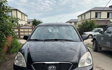 KIA Carens III (RP), 2010 год, 650 000 рублей, 2 фотография