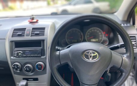 Toyota Corolla, 2012 год, 910 000 рублей, 8 фотография