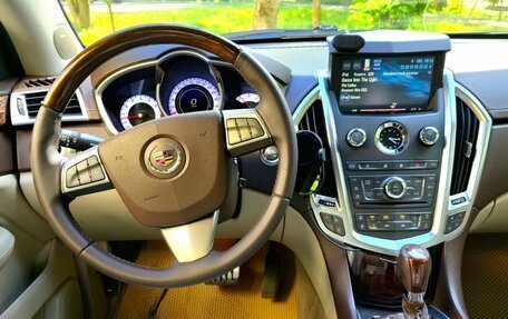 Cadillac SRX II рестайлинг, 2010 год, 980 000 рублей, 21 фотография