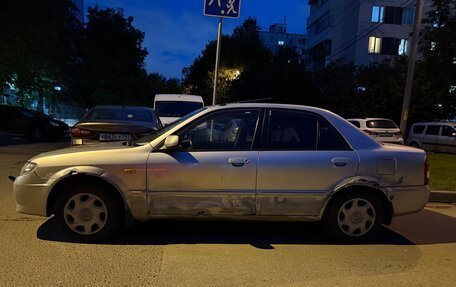 Mazda 323, 2002 год, 140 000 рублей, 9 фотография