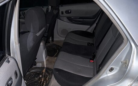 Mazda 323, 2002 год, 140 000 рублей, 10 фотография