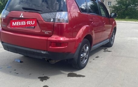 Mitsubishi Outlander III рестайлинг 3, 2011 год, 970 000 рублей, 4 фотография
